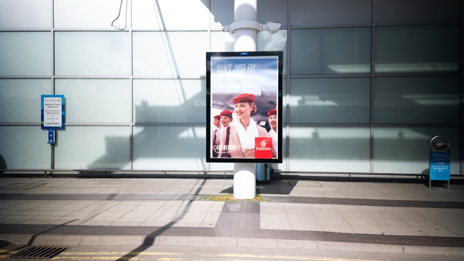 Digital advertising screen in an airport arrivals meeting area